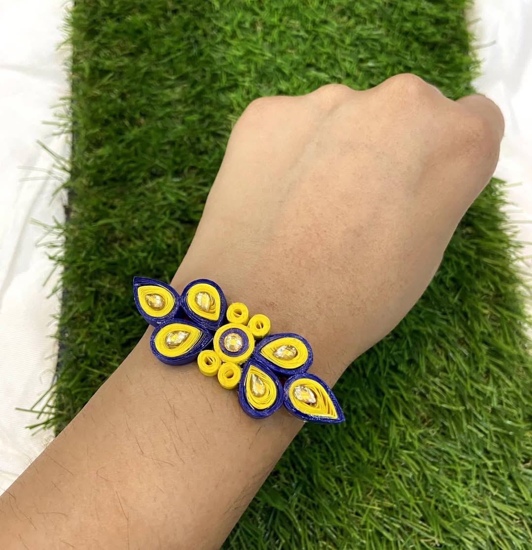 Neela Noor paper quilling rakhi